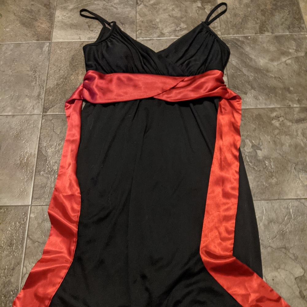 Black chiffon minidress with red satin tie